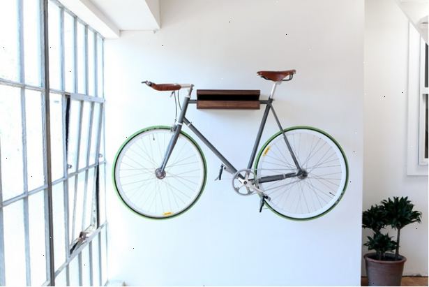Hoe maak je een fiets te hangen aan de muur